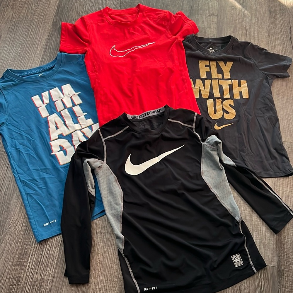 Four Nike boys small dri -fit shirts
